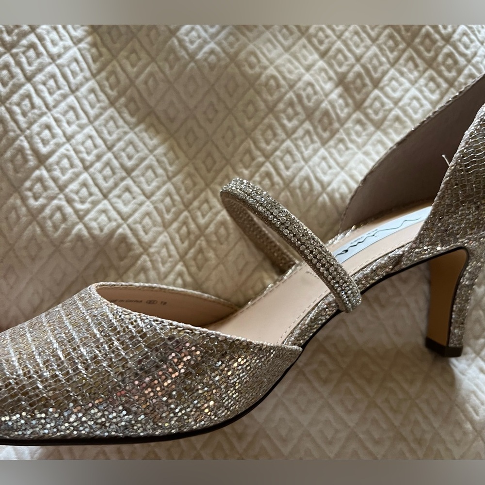 Nina  Size 7 Champange /rhinestone strap New in box. Slip on heels